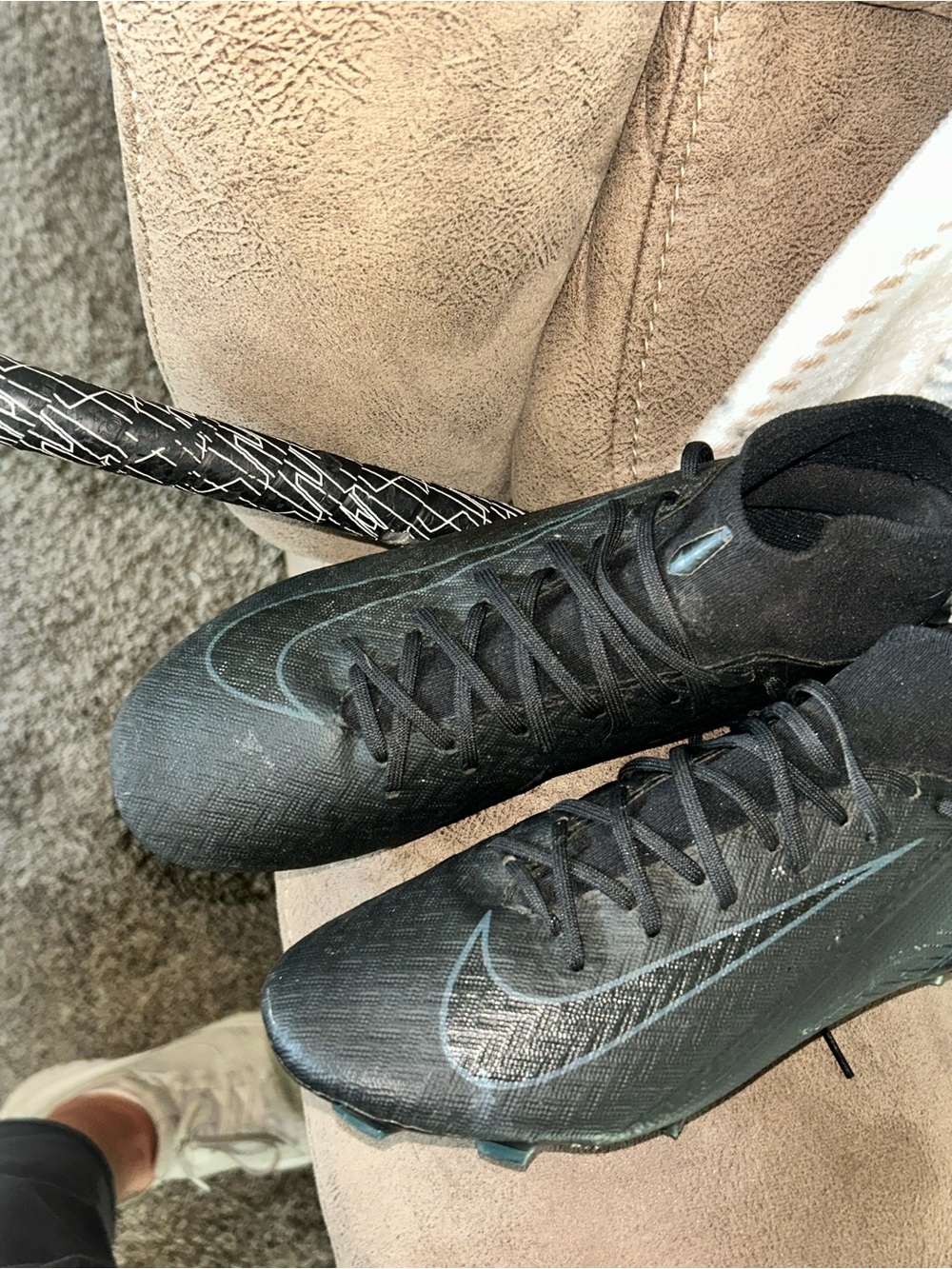Nike Men's Black Cleats with Teal Swoosh